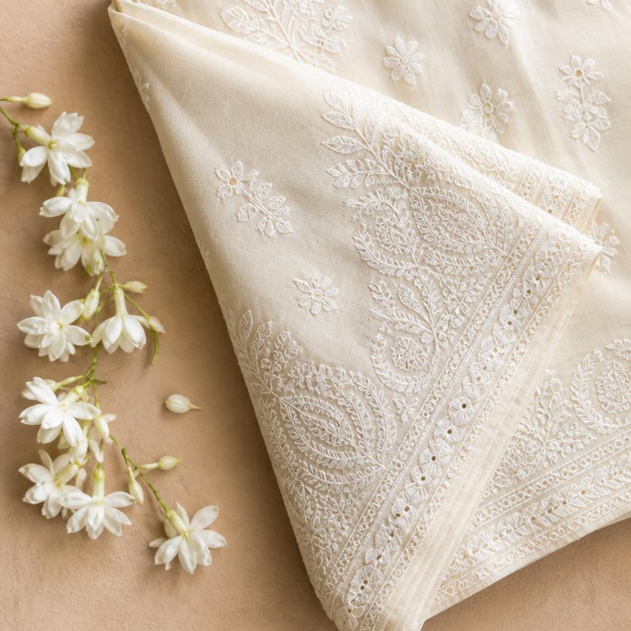 Close-up of fine white Chikankari embroidery